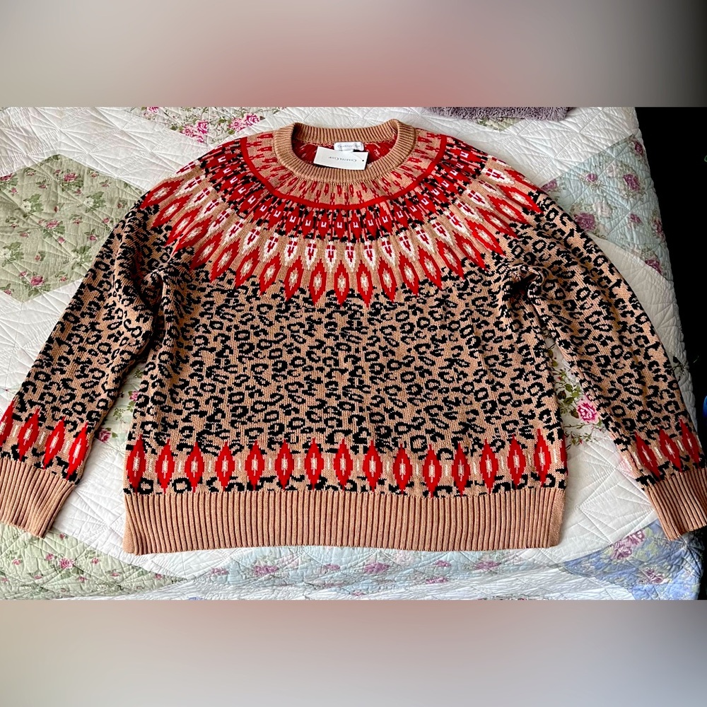 Unworn Women’s XL sweater. Great for holiday occasions and cold weather.